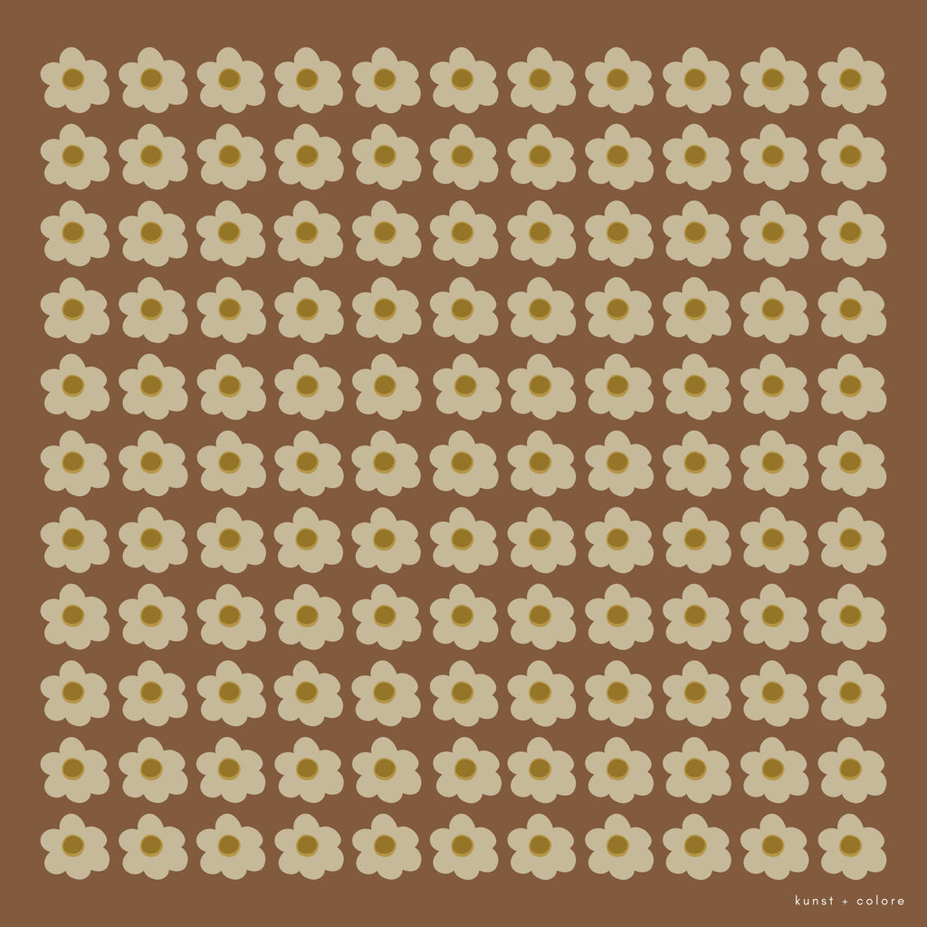 Full view of the 'Daisy Brown' scarf by Kunst & Colore. The print features small cream-coloured daisies arranged in a uniform square, on a brown background.